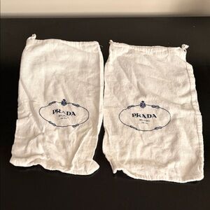 Two Prada dust bags
